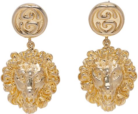 gucci gold lion head earrings|Gucci crossbody with lion head.